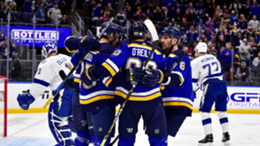 Ryan O'Reilly of the St. Louis Blues is congratulated by teammates after scoring against the Tampa Bay Lightning