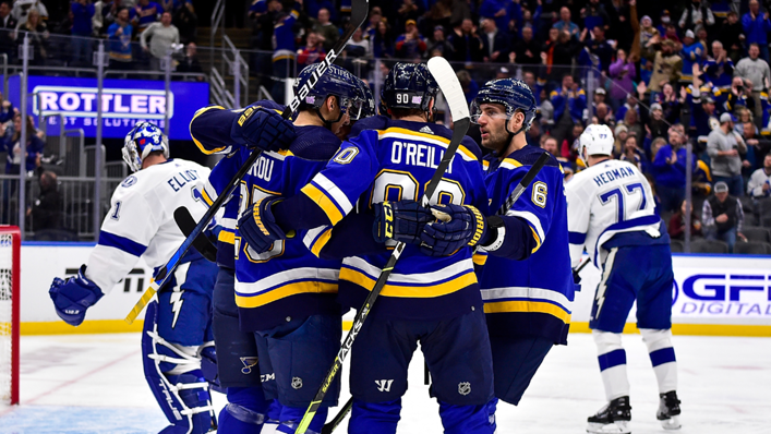 Ryan O'Reilly of the St. Louis Blues is congratulated by teammates after scoring against the Tampa Bay Lightning