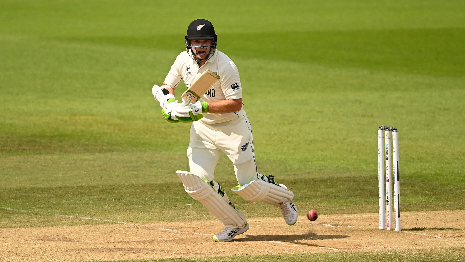 Tom Latham scores for New Zealand against India