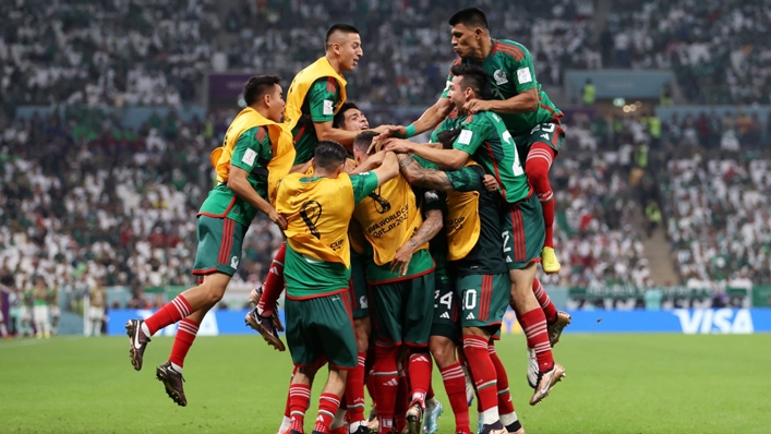 Mexico celebrate their second goal in Lusail