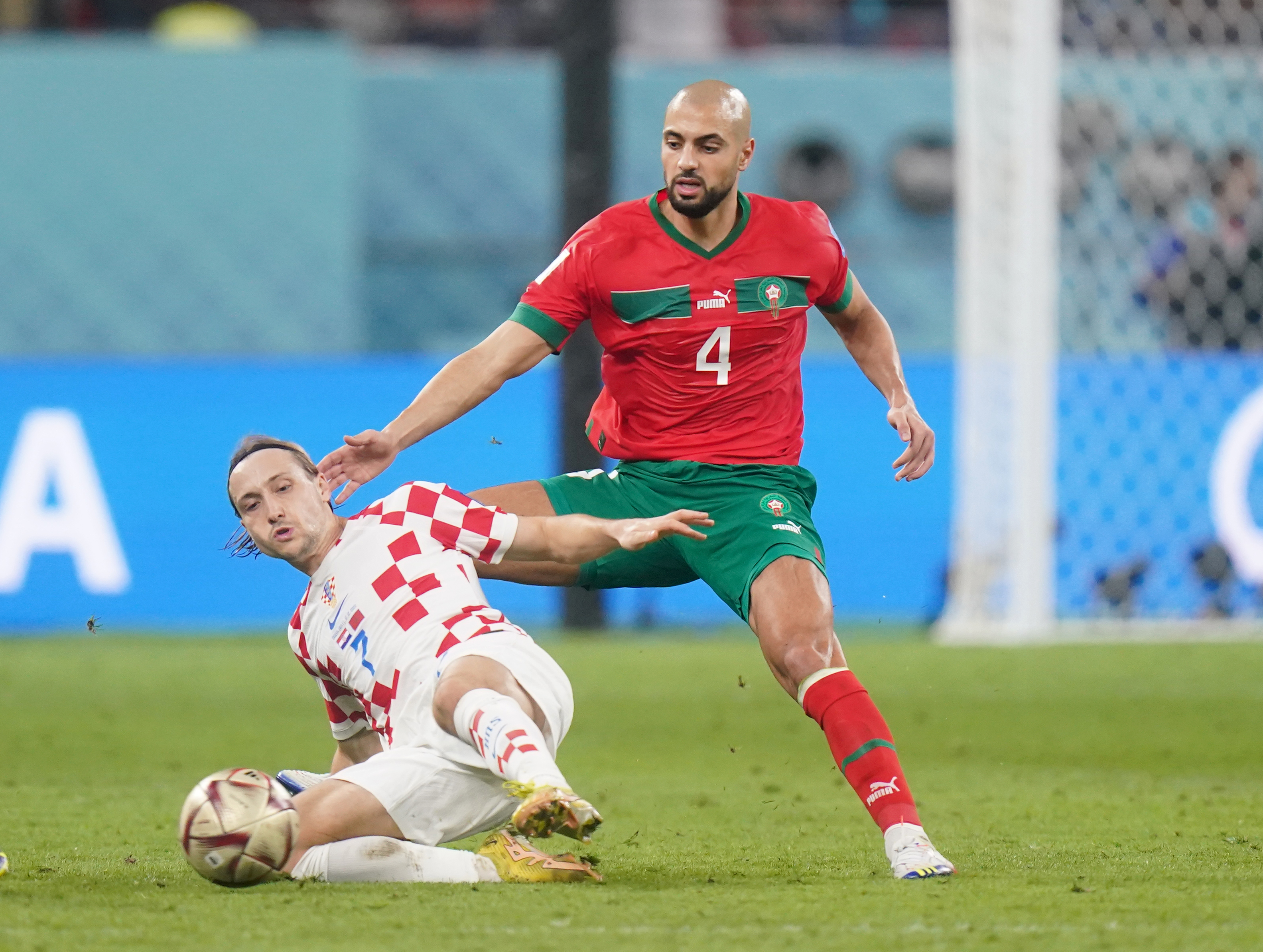 Sofyan Amrabat (right) in action