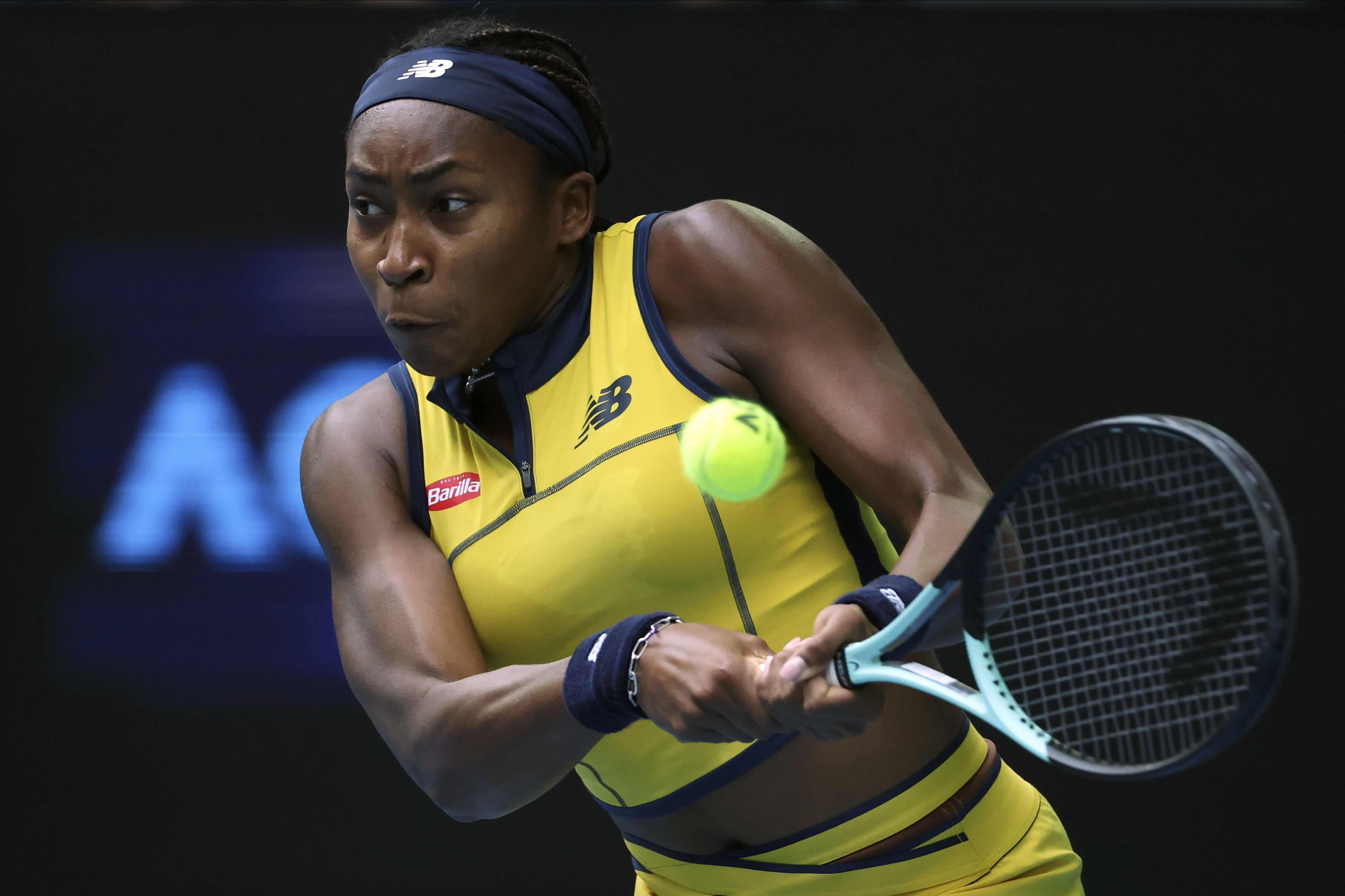 Coco Gauff strikes a backhand