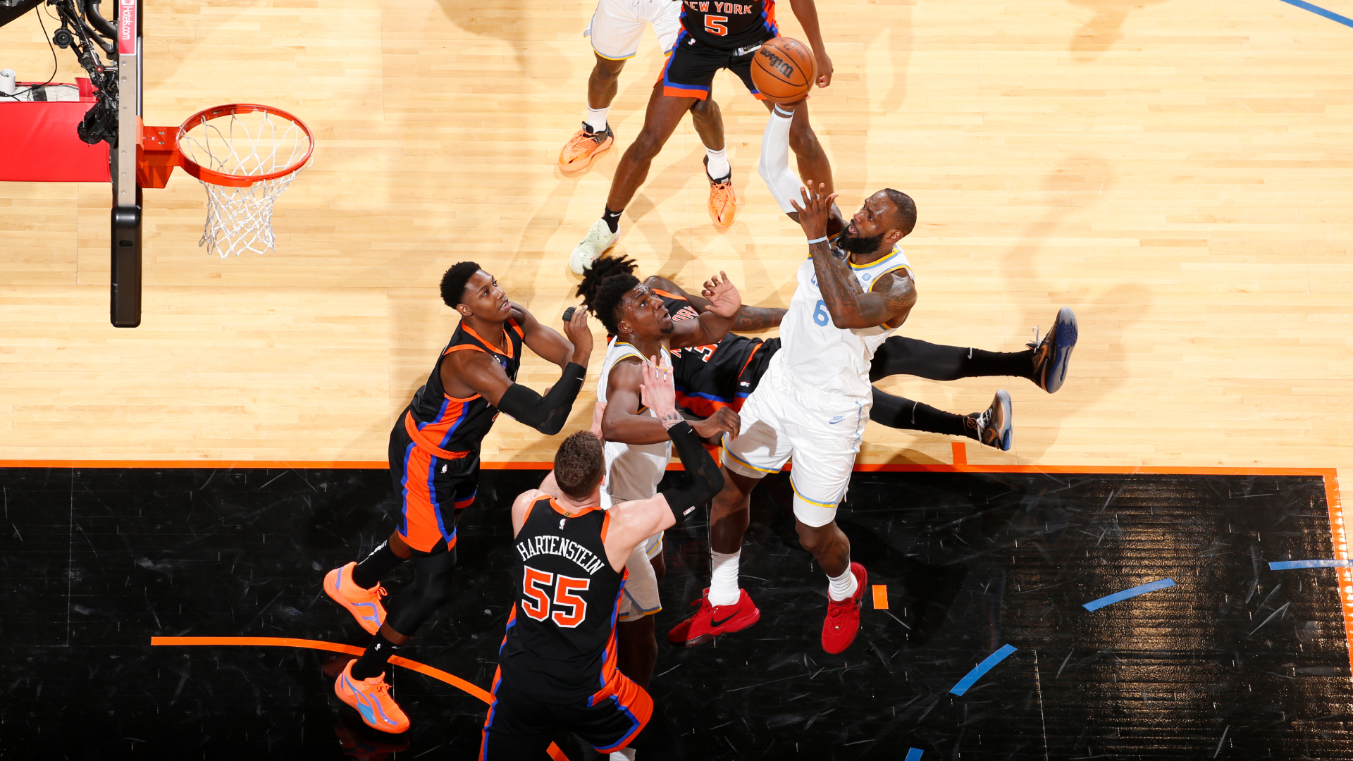 LeBron James soars to the rim above the traffic