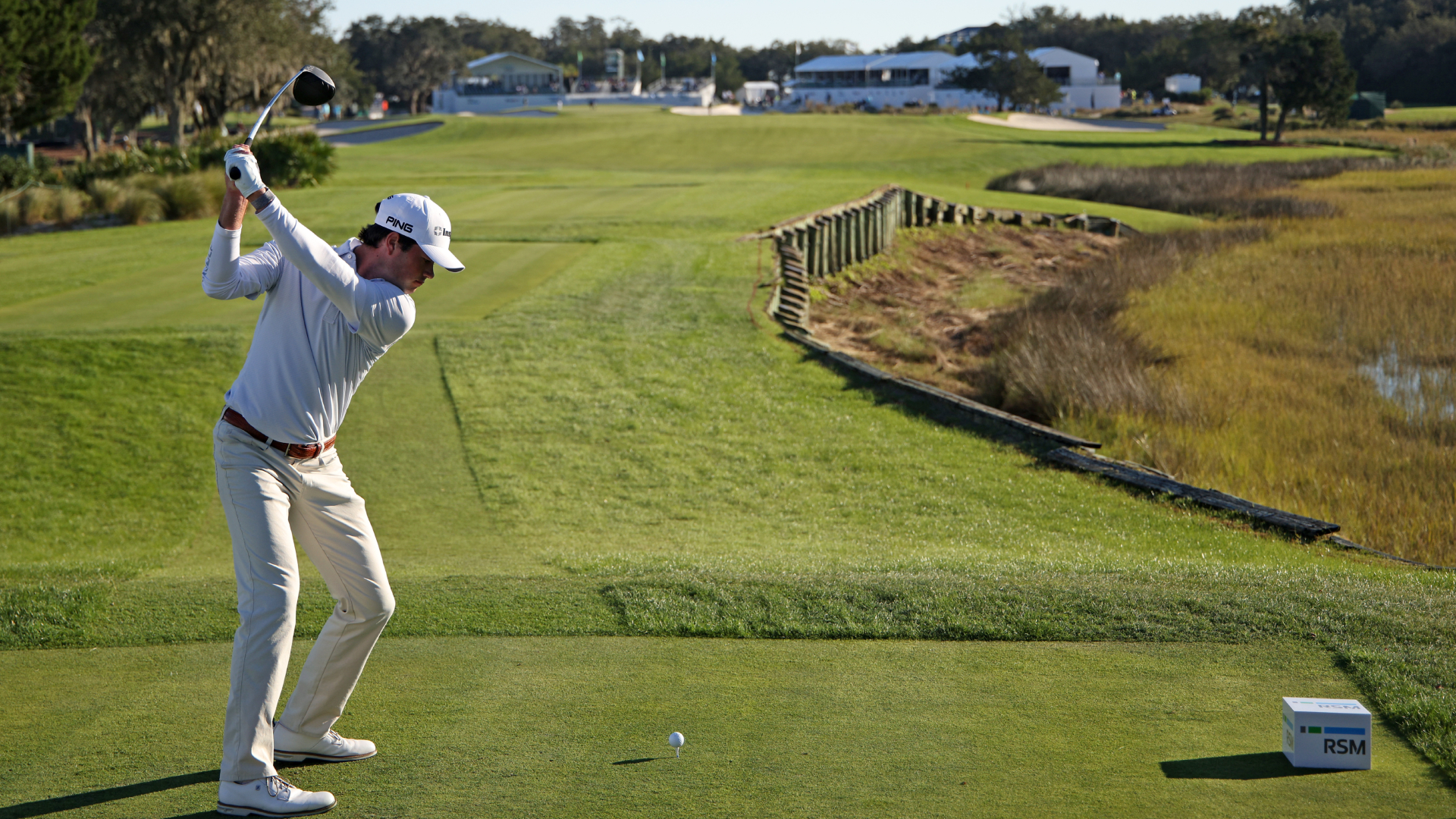 Cole Hammer tees off on the 18th hole of the Seaside Course