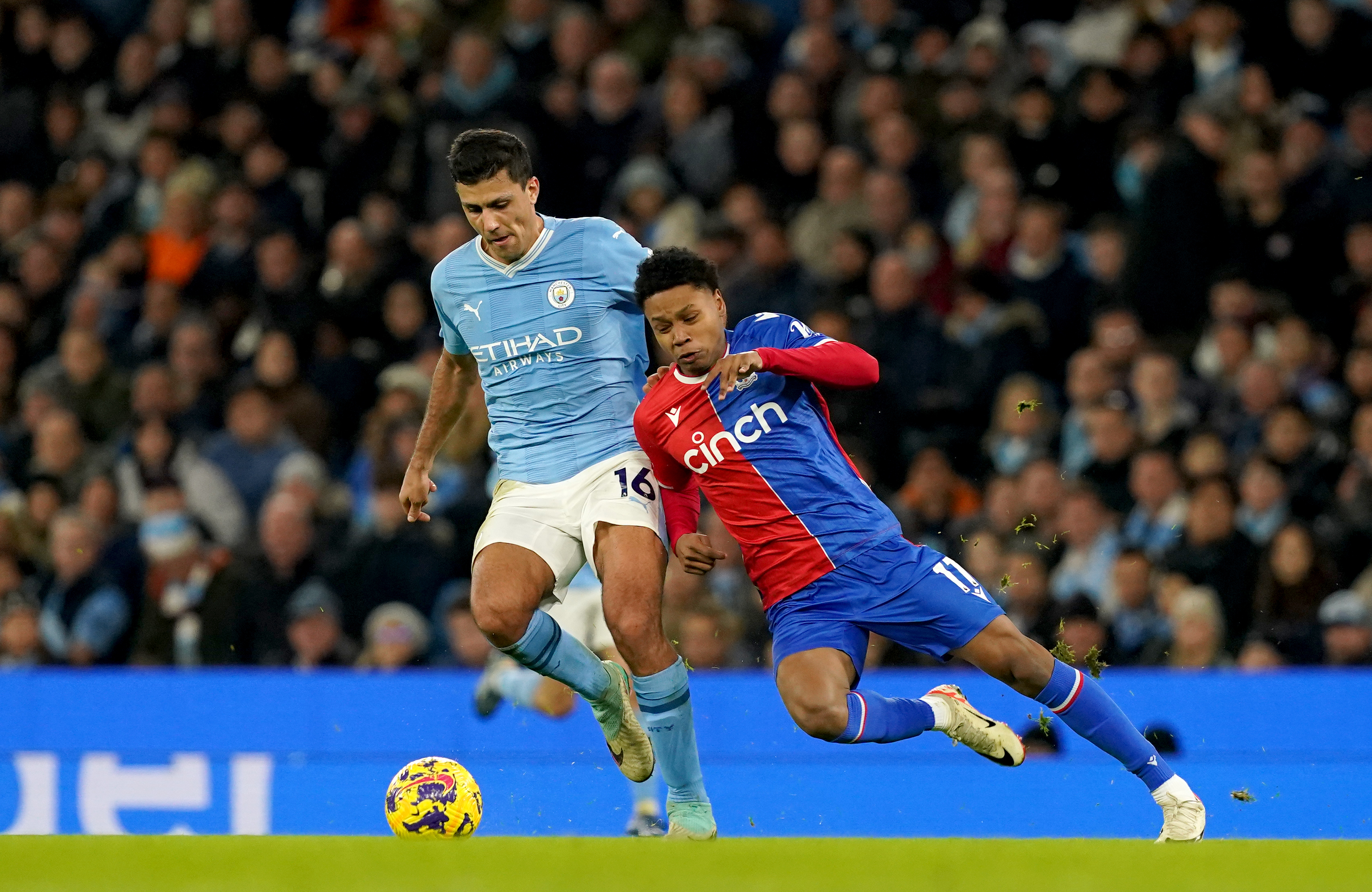 Manchester City’s Rodri battles for the ball with Crystal Palace’s Matheus Franca