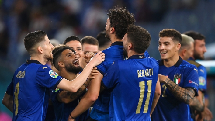Italy's players celebrate with Domenico Berardi and Manuel Locatelli