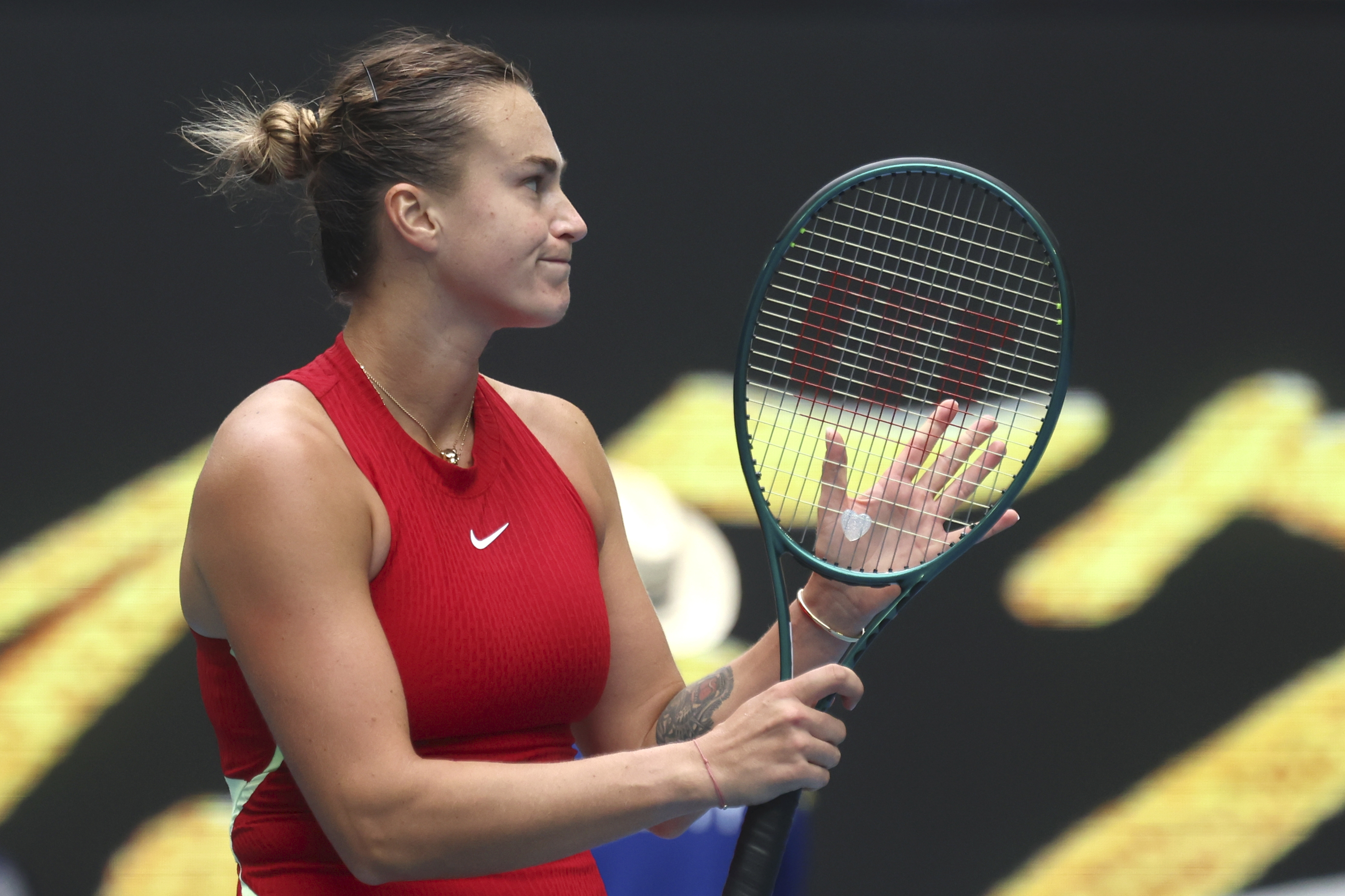 Aryna Sabalenka applauds at the end of the match