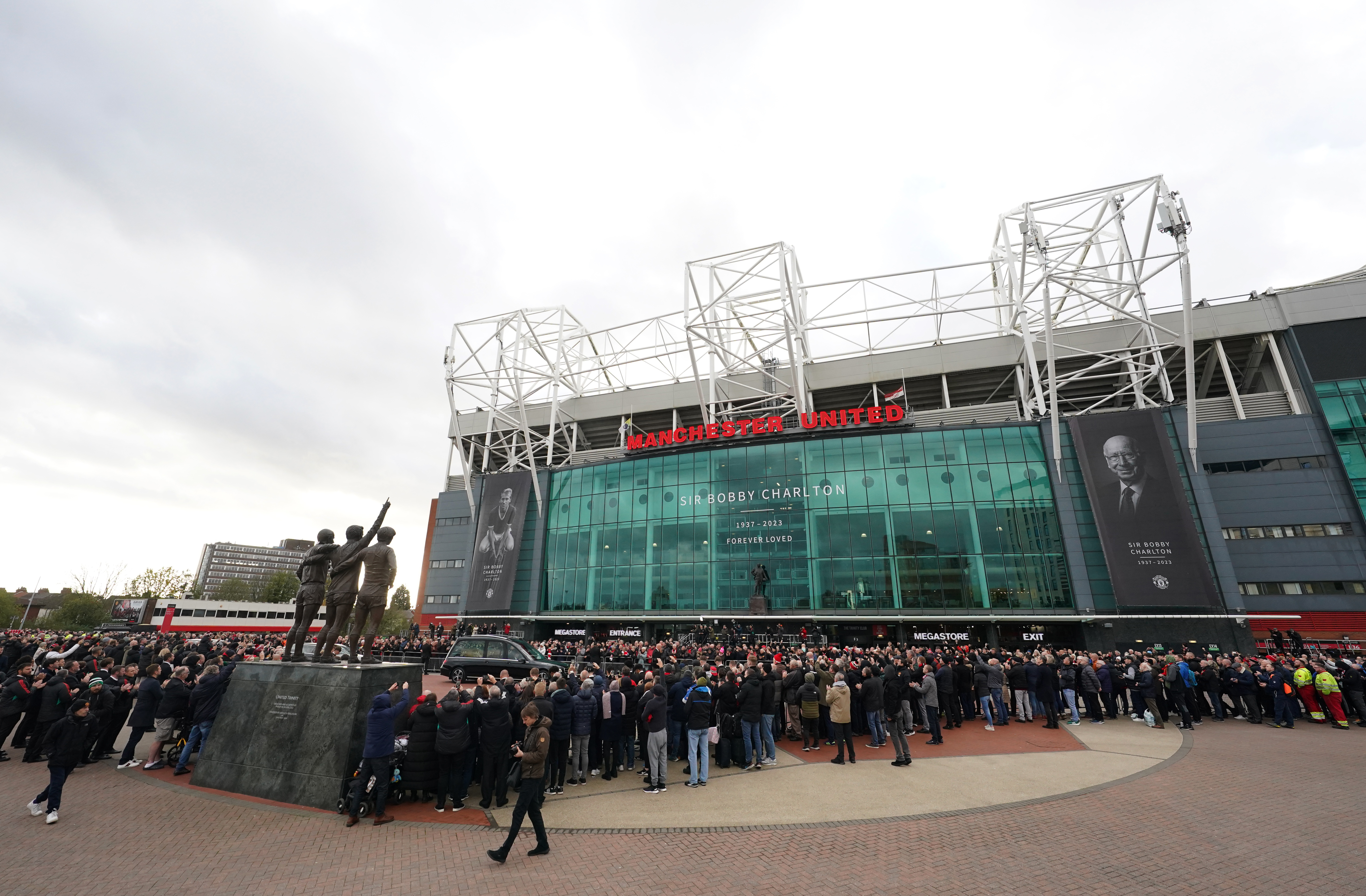 The funeral procession arrives outside Old Trafford (David Davies/PA)