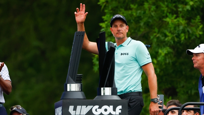 Henrik Stenson waves to the crowd as he accepts his trophy for winning LIV Golf Bedminster
