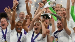 Leah Williamson (front, centre) lifts the Women's European Championship trophy