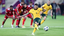 Jamie Maclaren scores a penalty in Australia's 2-2 draw with Oman in World Cup qualifying