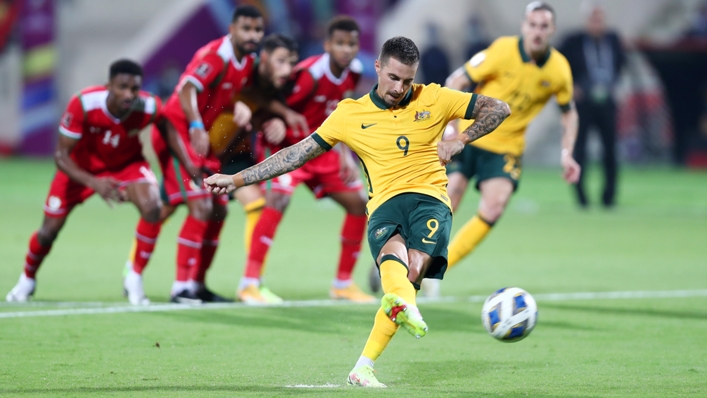 Jamie Maclaren scores a penalty in Australia's 2-2 draw with Oman in World Cup qualifying