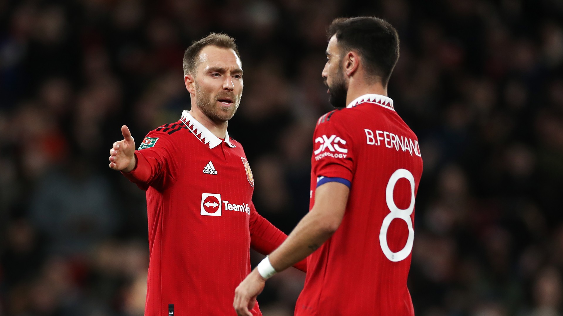 Christian Eriksen (left) and Bruno Fernandes celebrate the former's opening goal against Burnley