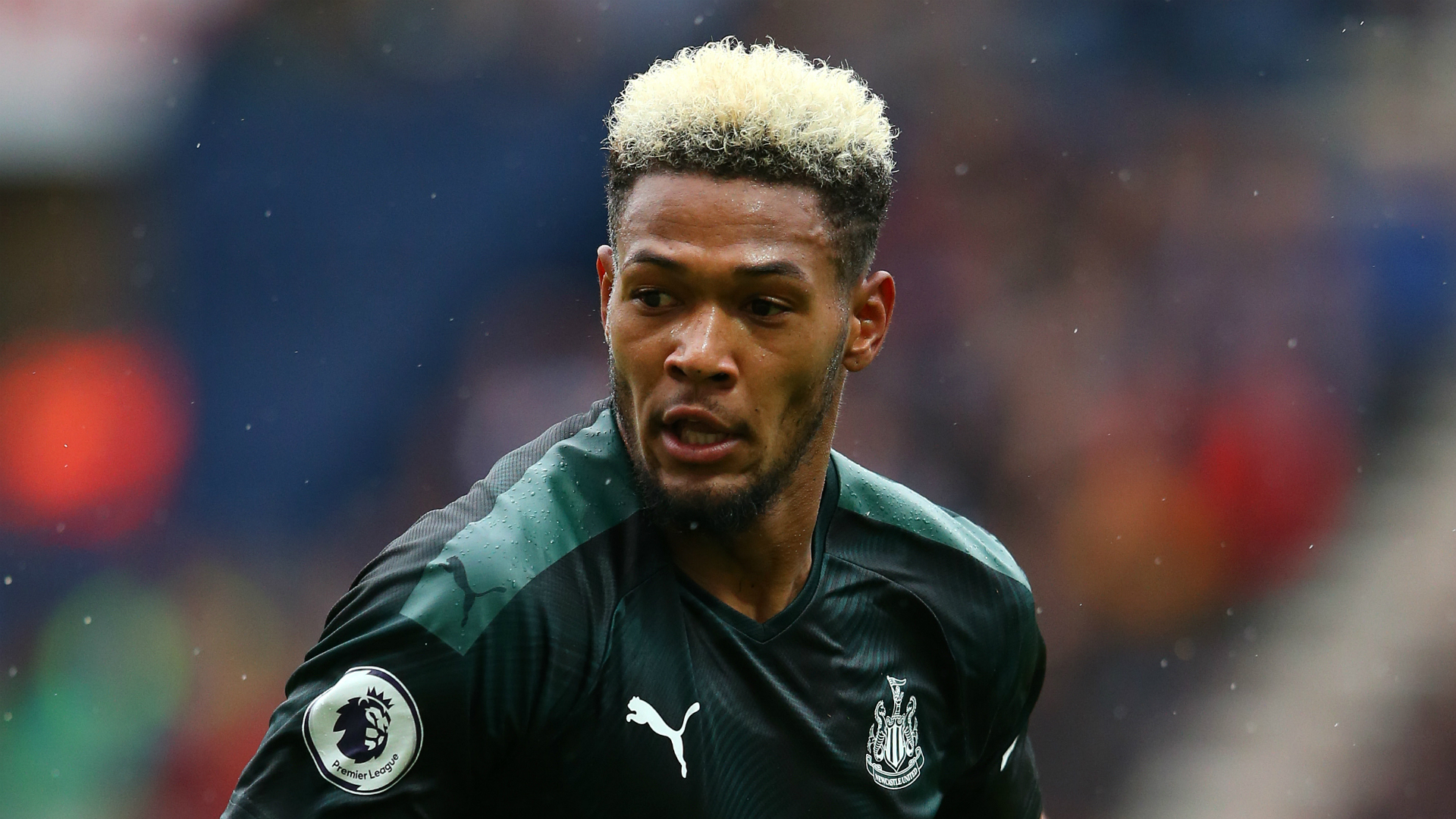 NUFC number nine Joelinton wearing the green away kit in a pre-season game.