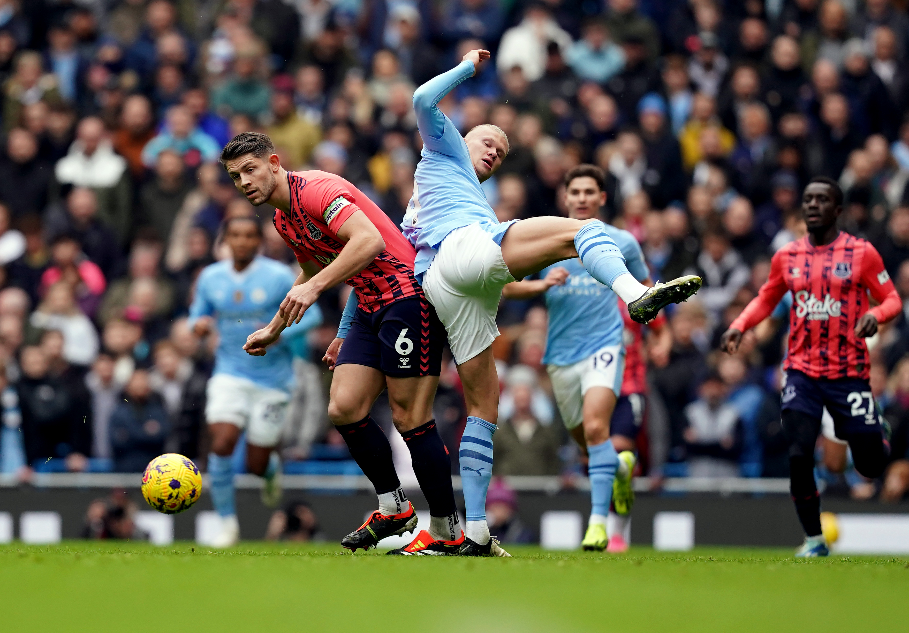 James Tarkowski challenges Erling Haaland