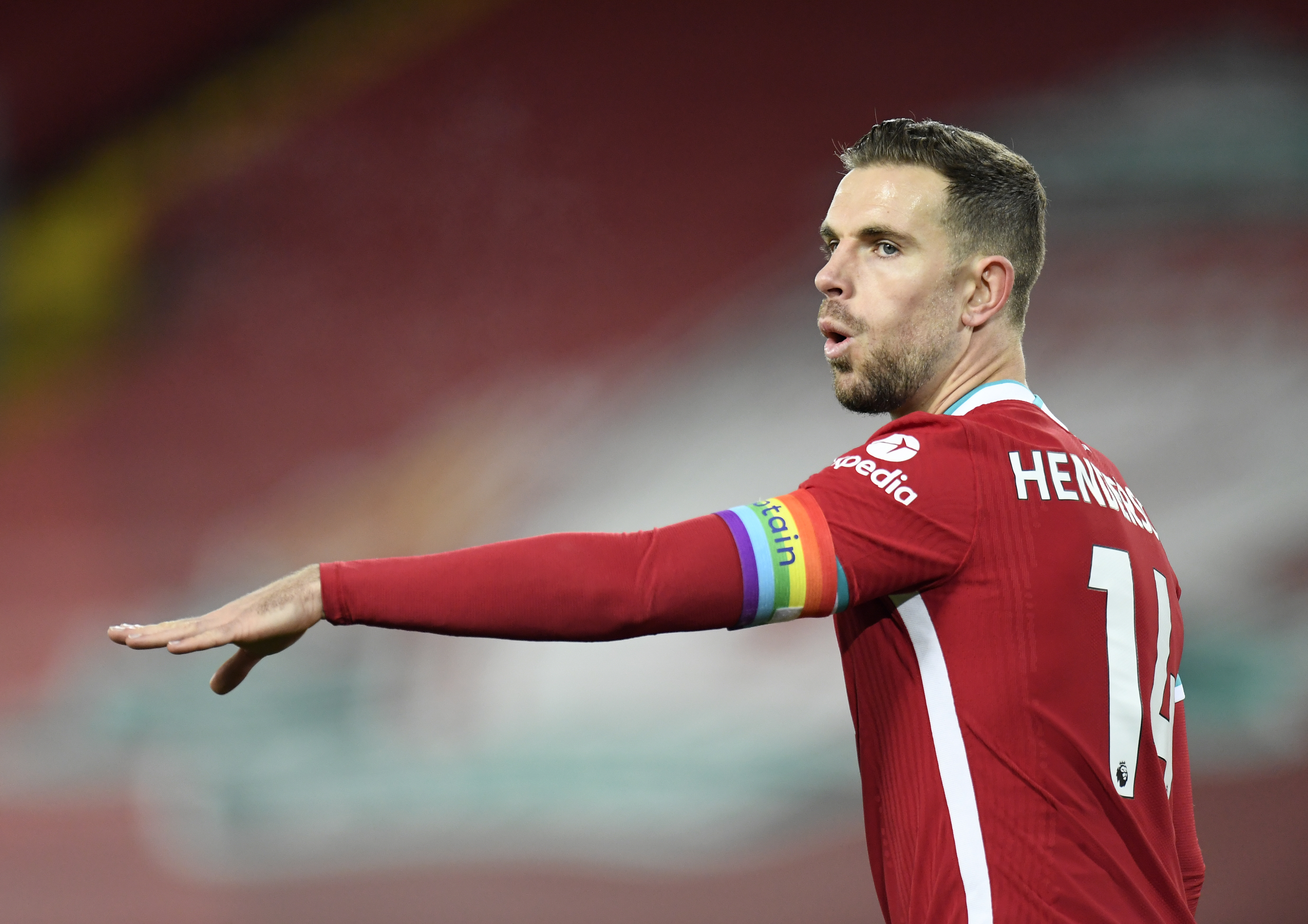 Liverpool’s Jordan Henderson wears a rainbow coloured captain’s armband in support of the Rainbow Laces campaign