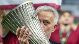 Roma boss Jose Mourinho holds the Europa Conference League trophy