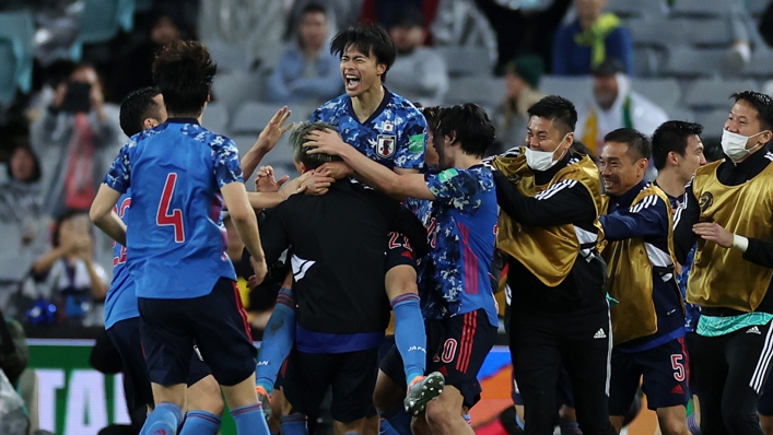 Kaoru Mitoma celebrates his winner for Japan to reach Qatar 2022