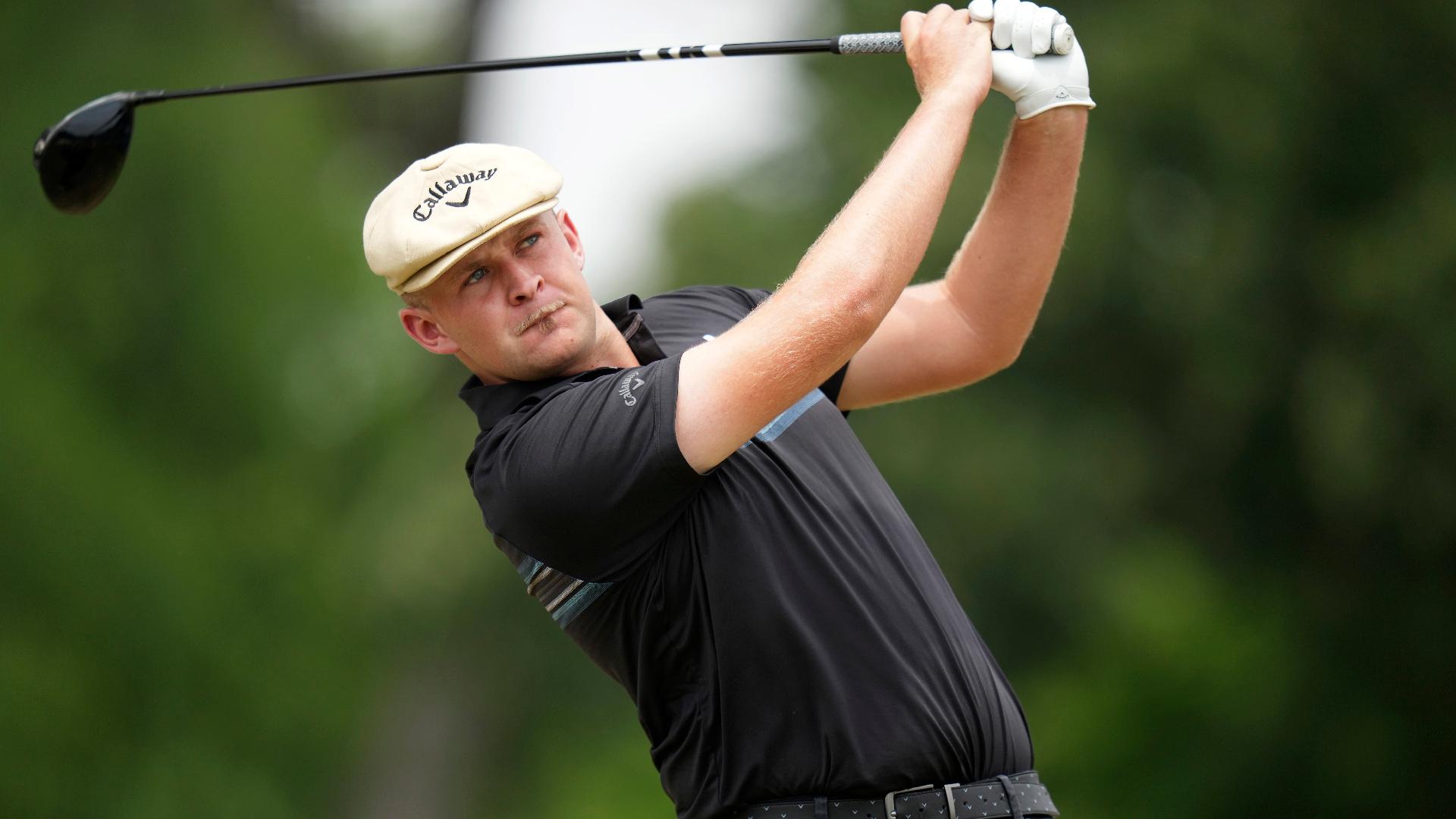 Harry Hall hits a tee shot on the third hole (LM Otero/AP)