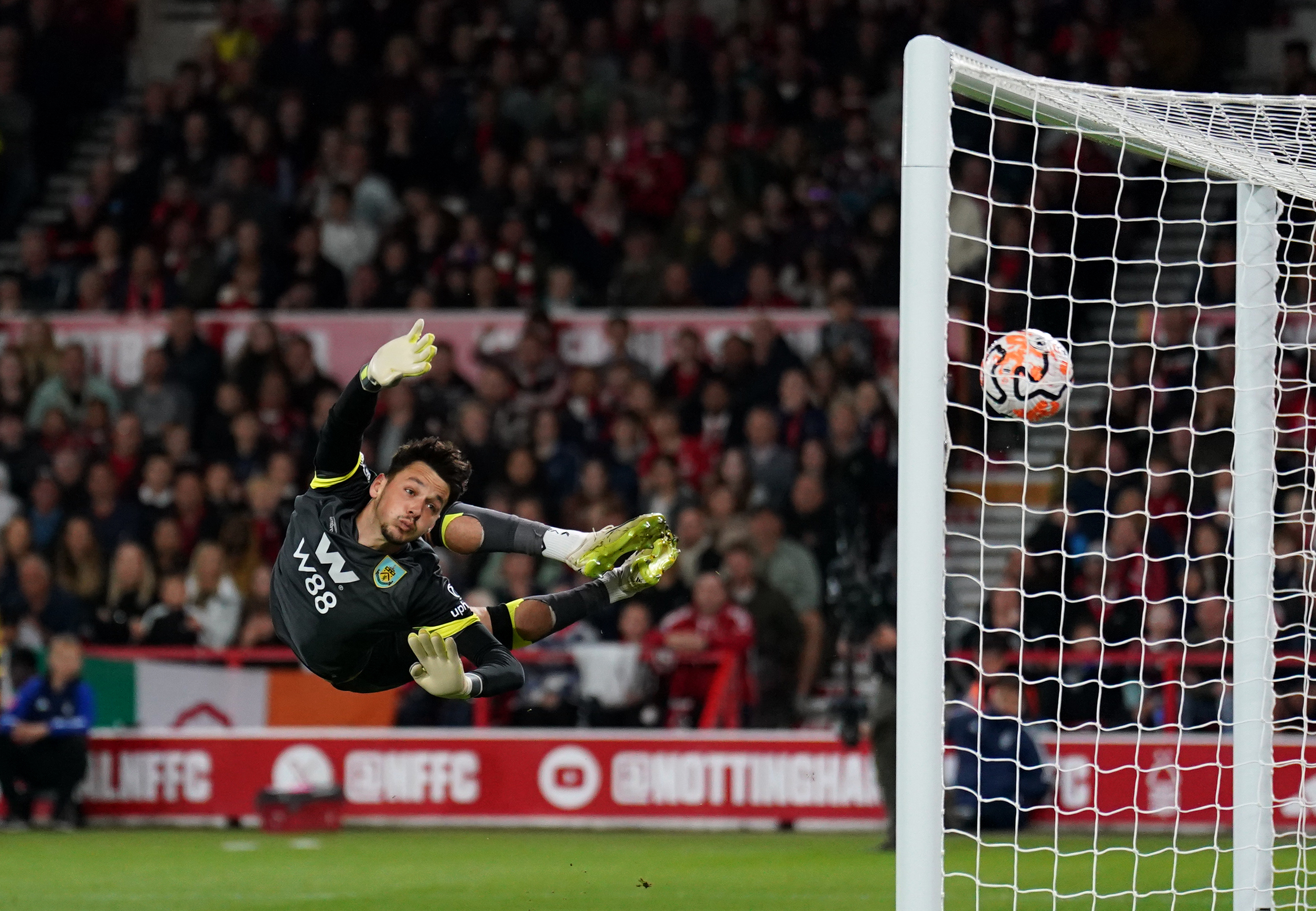 Callum Hudson-Odoi's shot flies past Burnley goalkeeper James Trafford