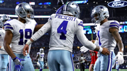 Dak Prescott of the Dallas Cowboys celebrates his rushing touchdown with teammates during the fourth quarter against the San Francisco 49ers