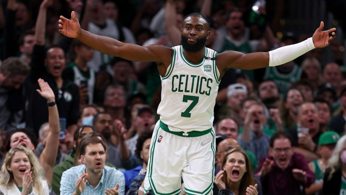Jaylen Brown basks in the Boston crowd's cheers as the Celtics run away with Game 4