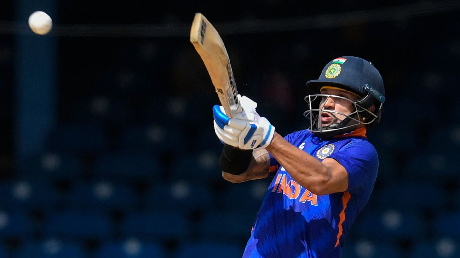 Dhawan's India cling on to sink West Indies in tense ODI series opener