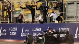 Mercedes celebrate as Lewis Hamilton crosses the line to win the Bahrain Grand Prix
