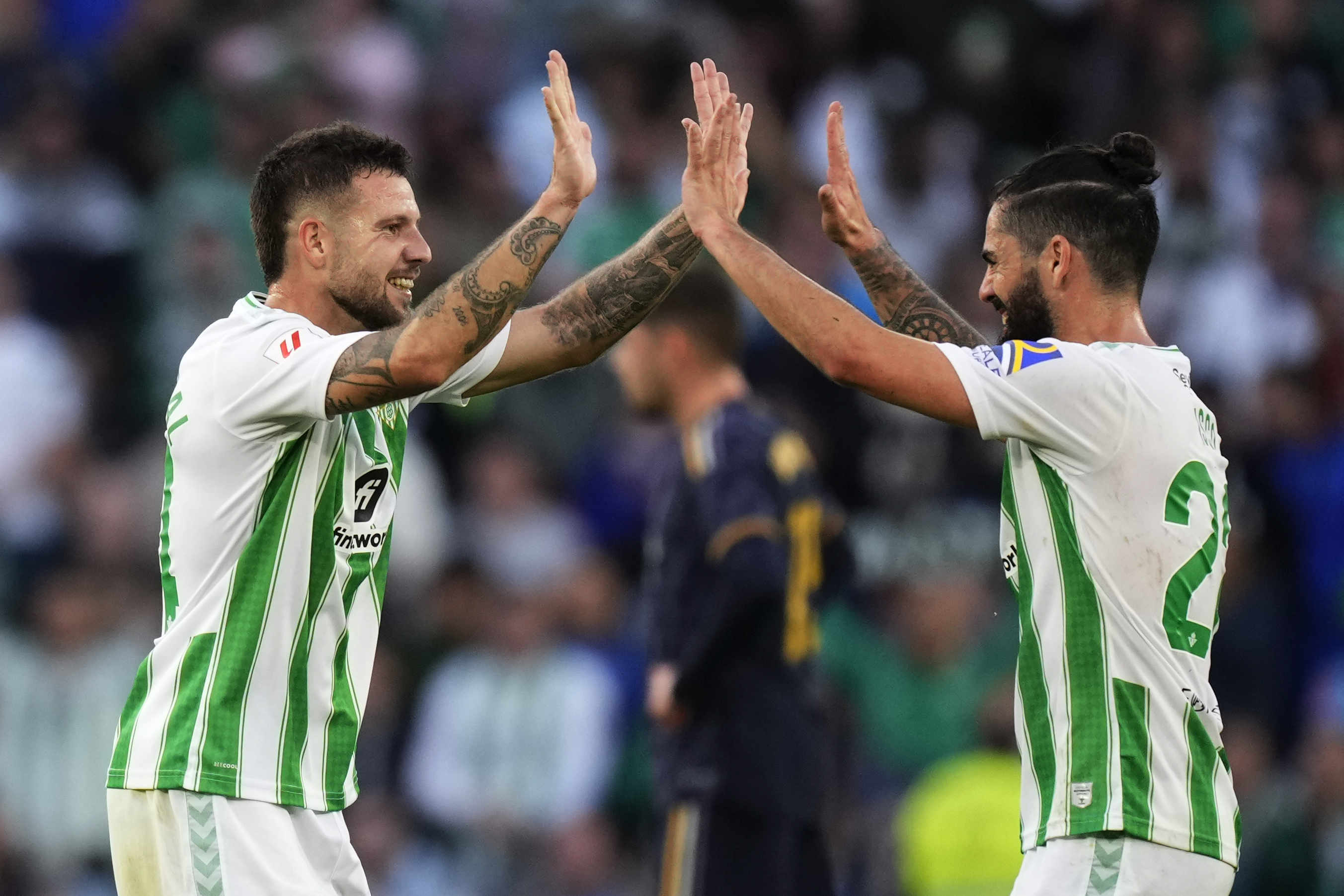 Betis’ Aitor Ruibal (left) celebrates with Isco after scoring his side’s equaliser against Real Madrid