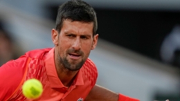 Novak Djokovic watches the ball in his win over Marton Fucsovics (Thibault Camus/AP)