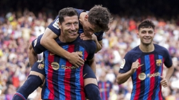 Robert Lewandowski celebrates a Barcelona goal with teenage midfielders Gavi and Pedri