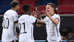 Germany celebrate a goal from Florian Wirtz (R)