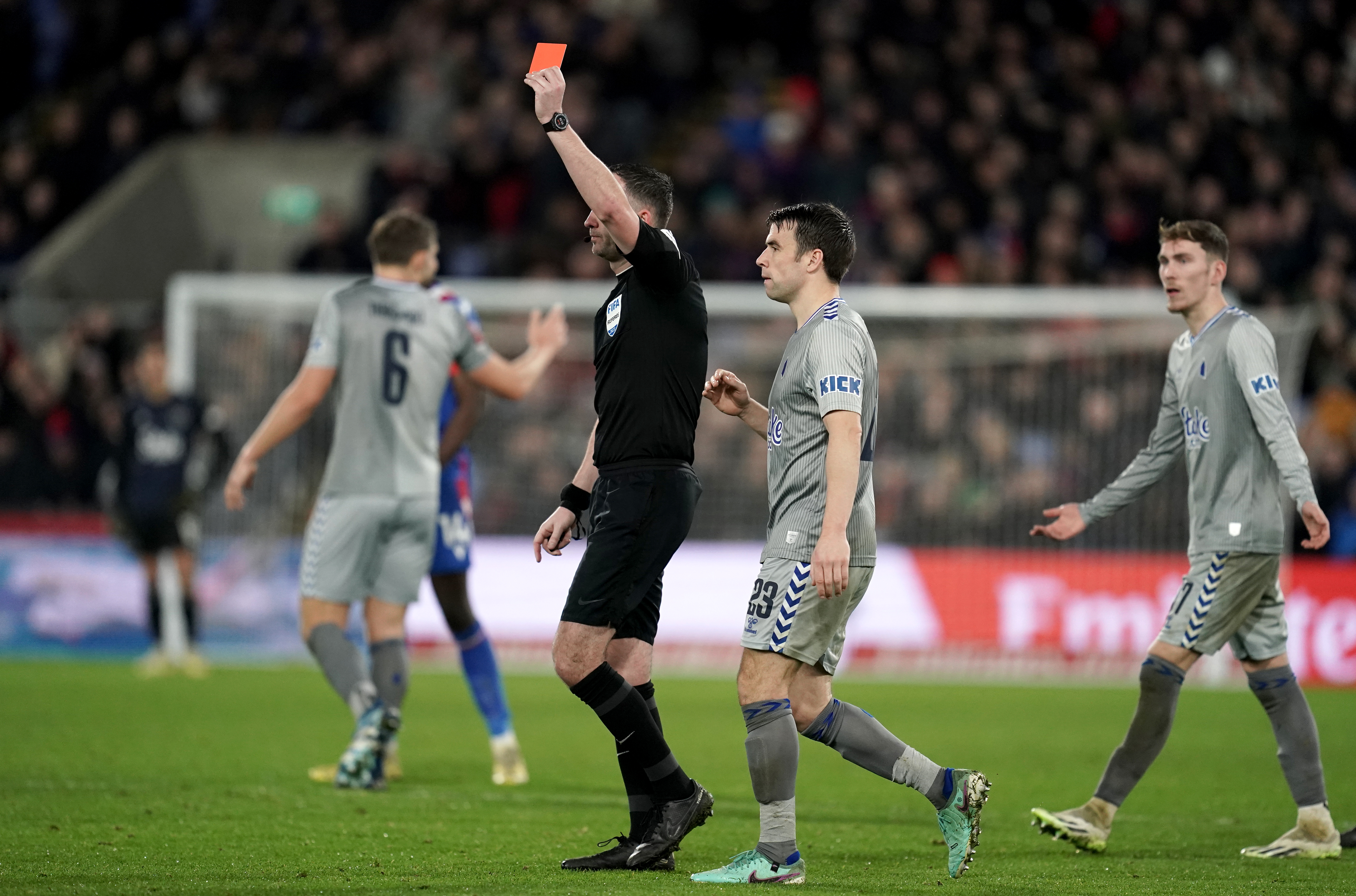 Chris Kavanagh shows a red card to Everton’s Dominic Calvert-Lewin (not pictured)
