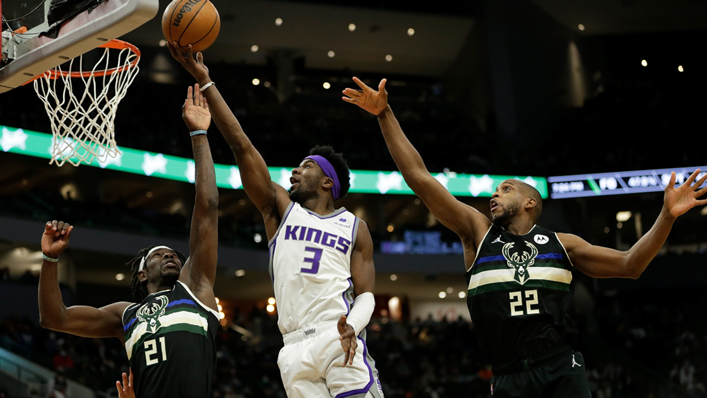 Terence Davis of the Sacramento Kings goes in for a score during the second half of the game against the Milwaukee Bucks
