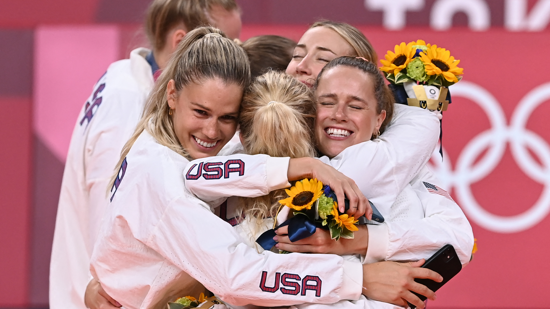 The United States team celebrate their volleyball gold medal