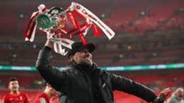 Jurgen Klopp celebrates leading Liverpool to an EFL Cup final triumph over Chelsea.