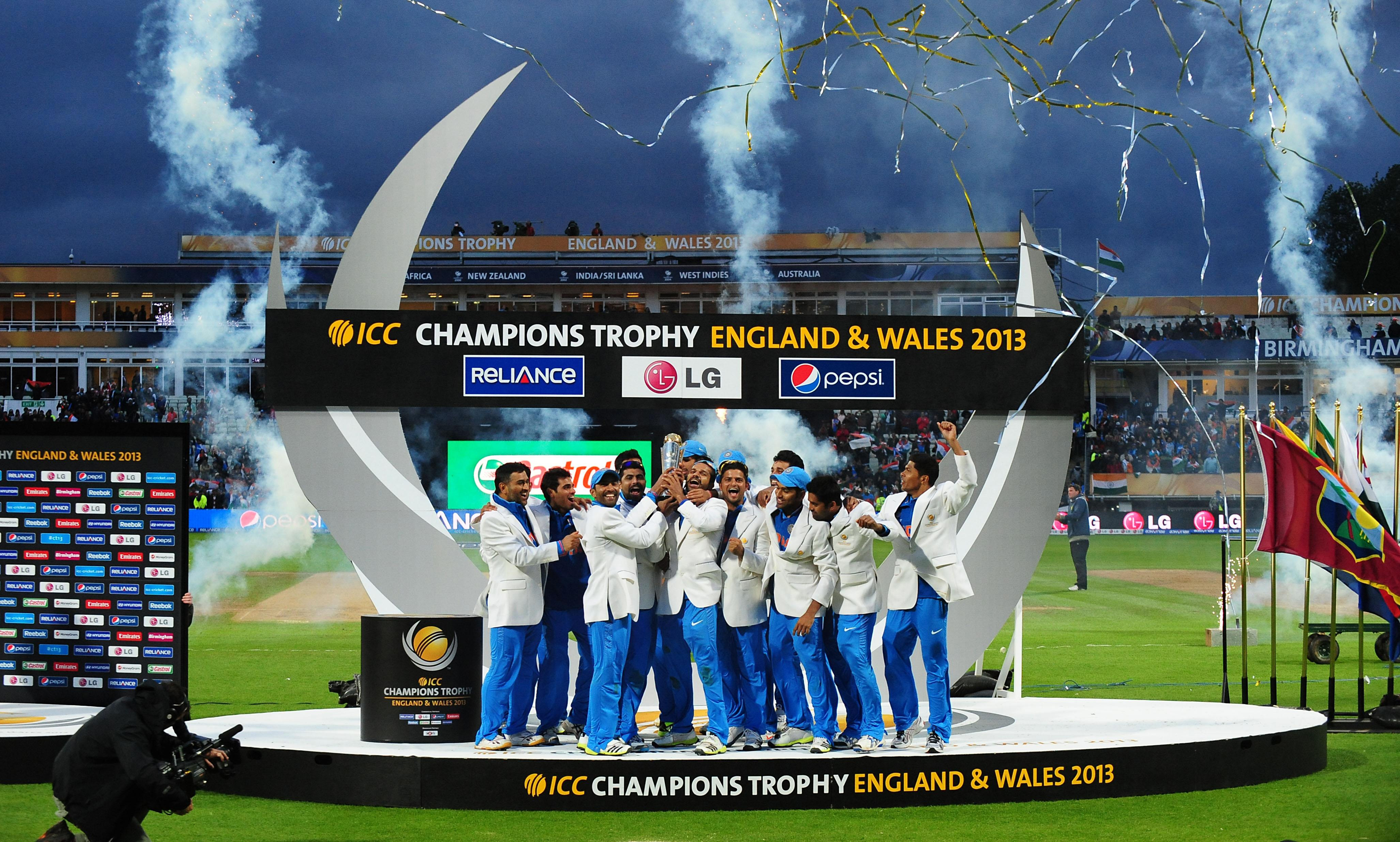 India celebrate with the trophy after beating England in the ICC Champions Trophy final at Edgbaston