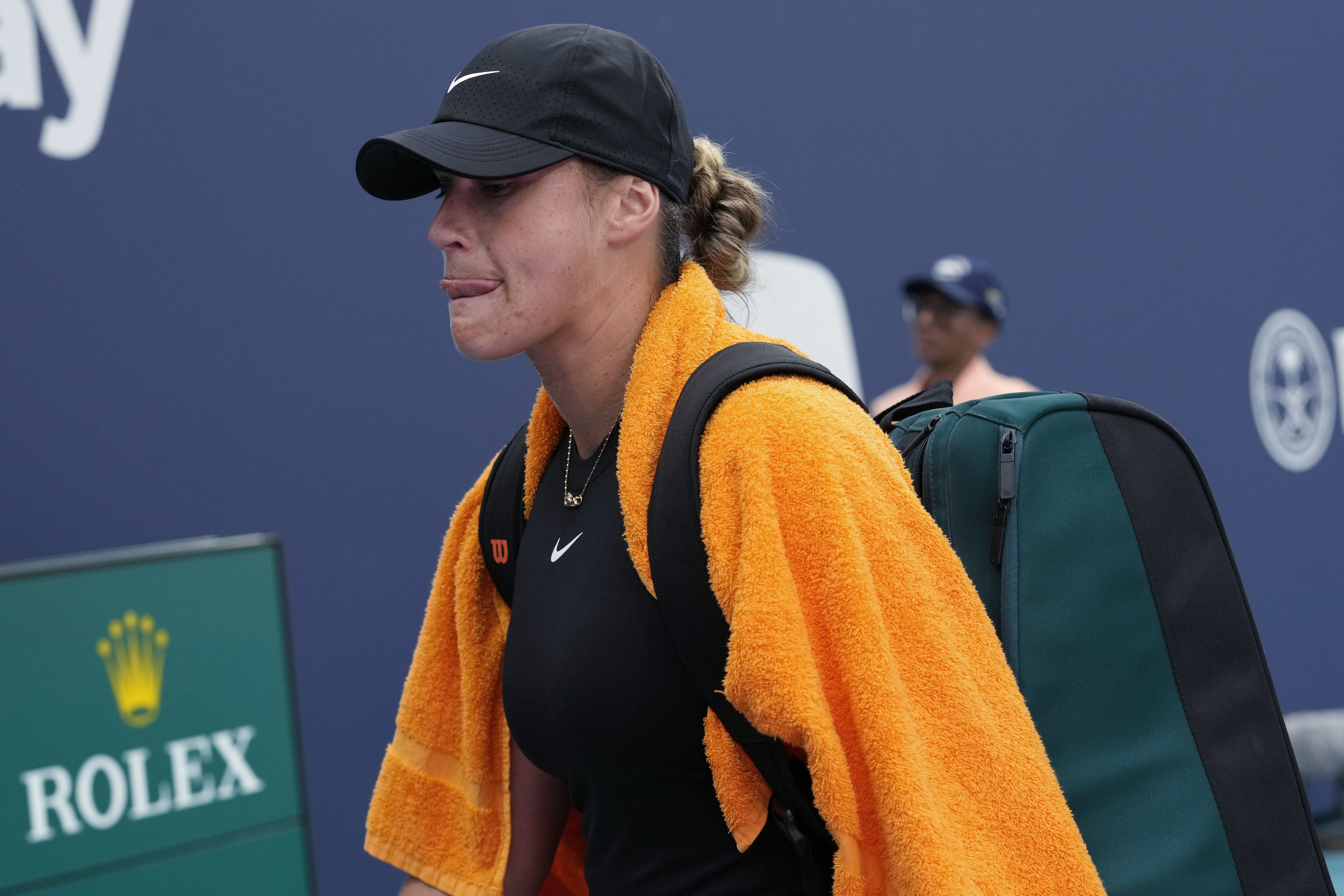 Aryna Sabalenka walks off the court after winning her match