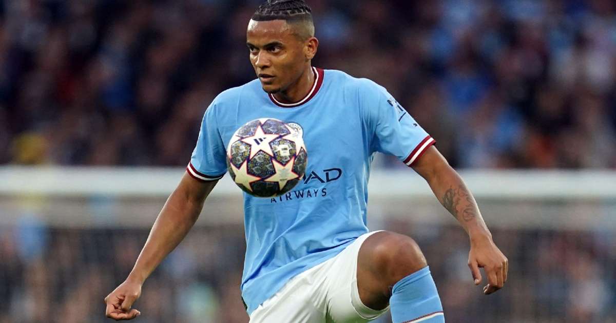 Manchester City's Manuel Akanji heads the ball during the