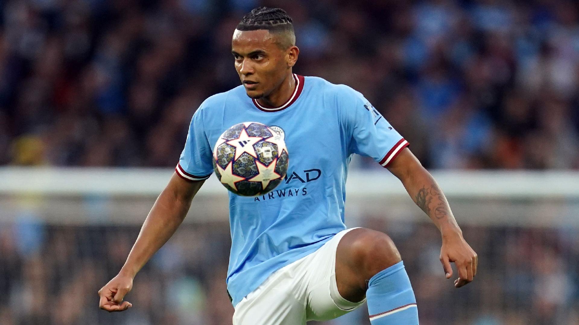 Manuel Akanji is eyeing the treble (Nick Potts/PA)