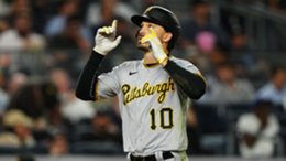 Bryan Reynolds of the Pittsburgh Pirates reacts after hitting a home run