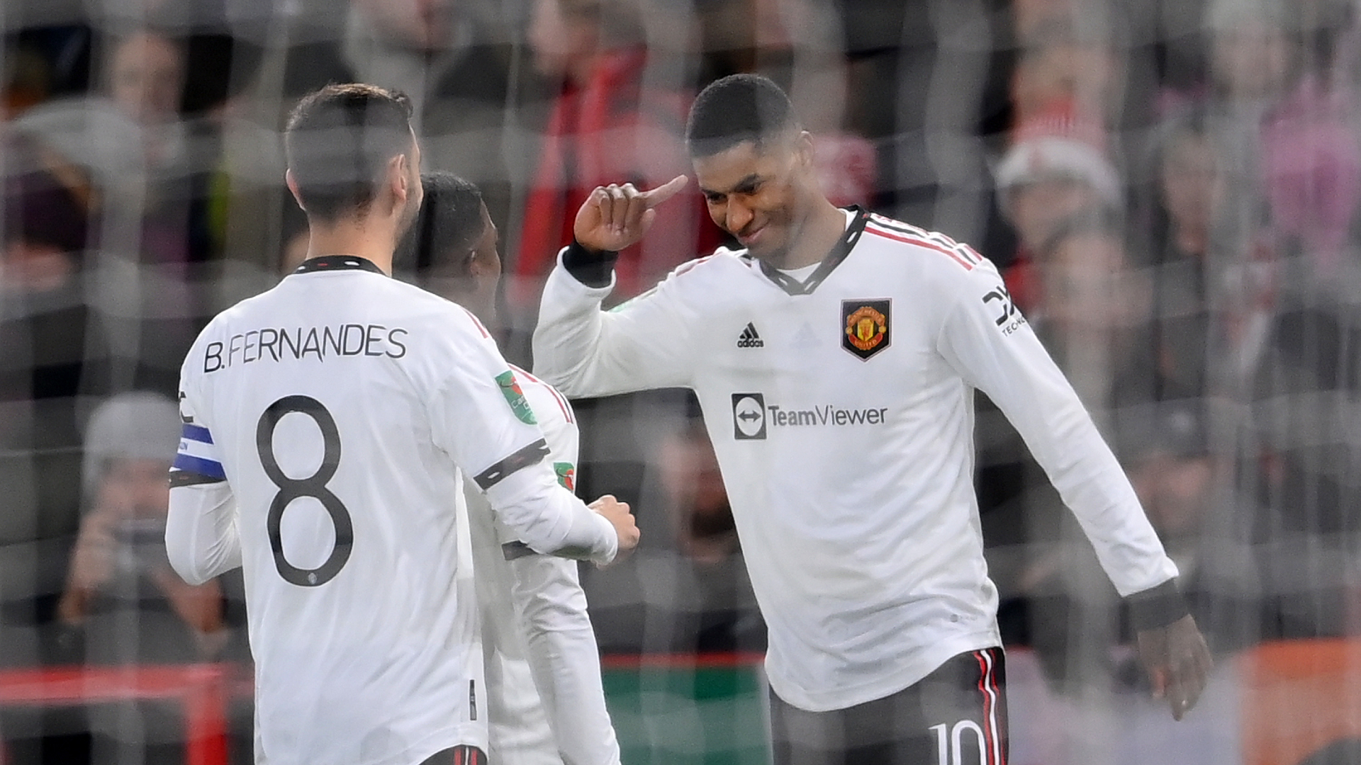 Marcus Rashford (R) celebrates scoring for Man Utd against Nottingham Forest in the EFL Cup