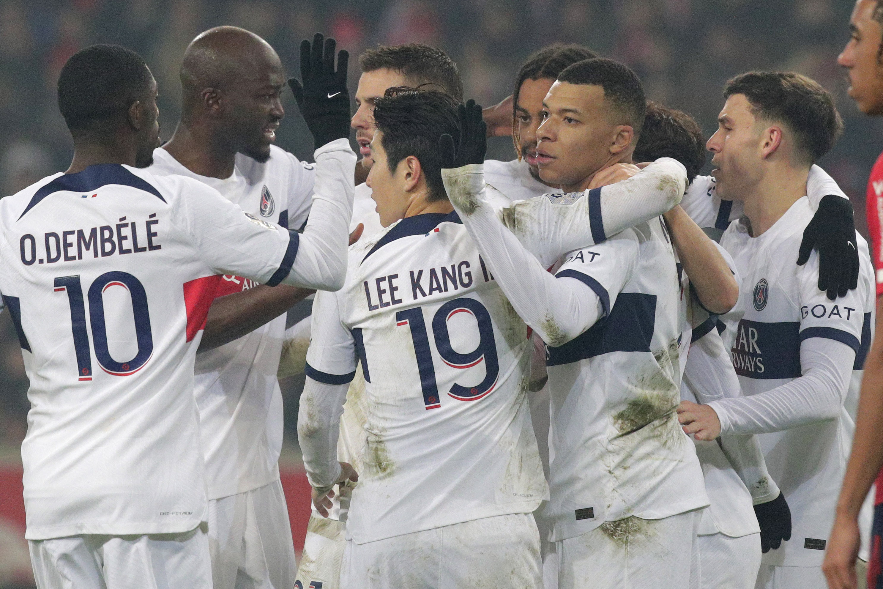Kylian Mbappe, second right, celebrates with team-mates after his opener