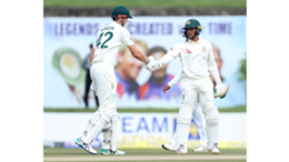 Cameron Green (left) and Usman Khawaja made half-centuries on day two in Galle