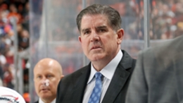 Peter Laviolette behind the Capitals bench.
