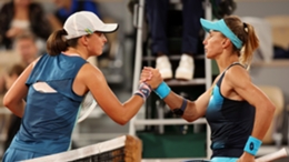 Iga Swiatek and Lesia Tsurenko shake hands after their French Open match