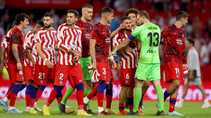 Atletico Madrid's players celebrate with Koke following the win over Sevilla