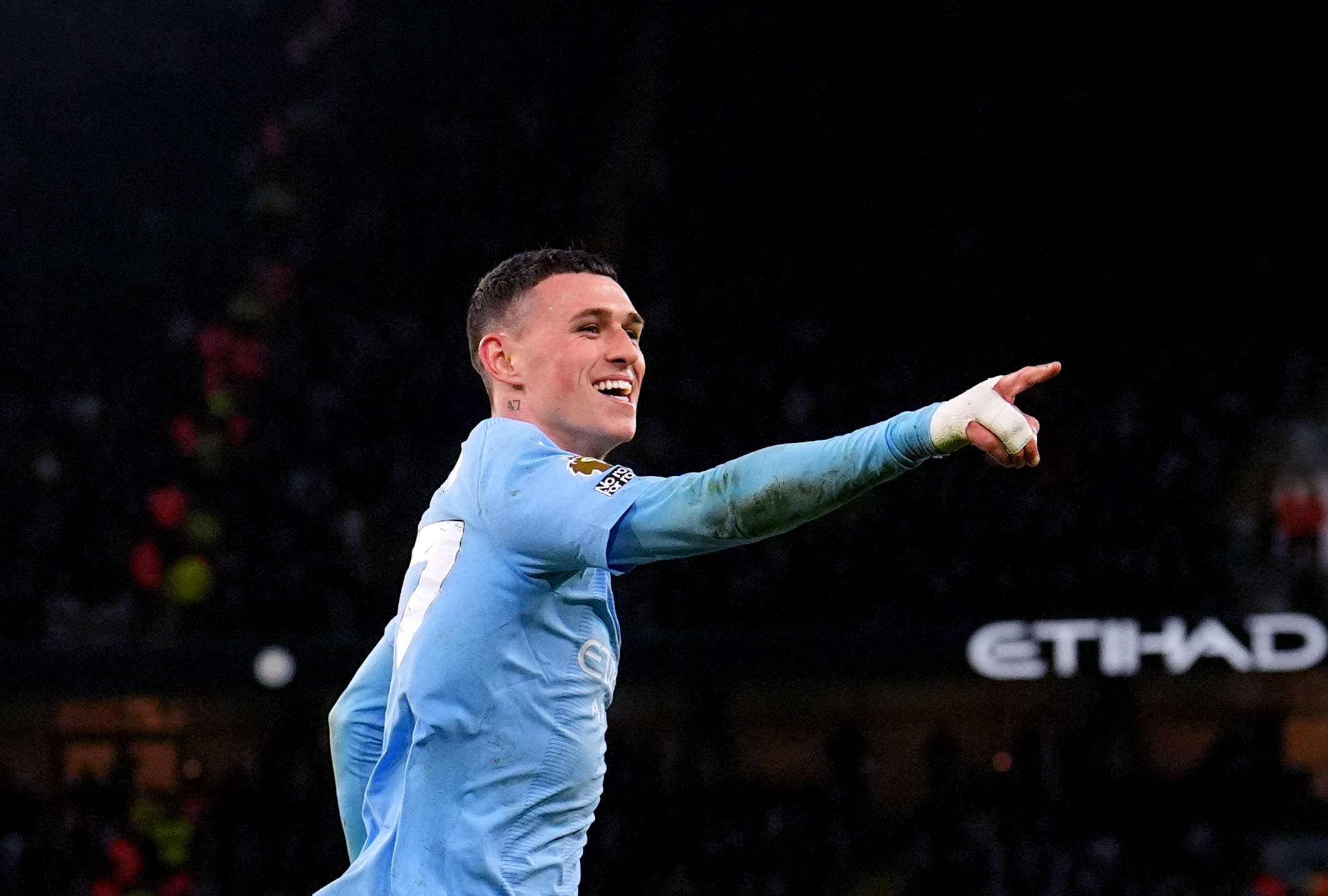 Phil Foden celebrates one of his three goals against Aston Villa