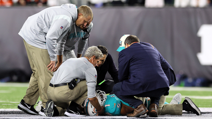 Medical staff tend to quarterback Tua Tagovailoa of the Miami Dolphins after an injury during the second quarter of the game against the Cincinnati Bengals