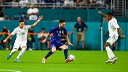 Lionel Messi weaving his way through the Honduras defenders